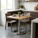Base de mesa inox OR 2202 em uso com tampo em ambiente gourmet moderno